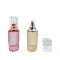 Bouteille d'émulsion en verre dépoli de haute qualité de luxe de couleur jaune rose avec tête de pompe à collier en argent rose pour crème pour le visage
