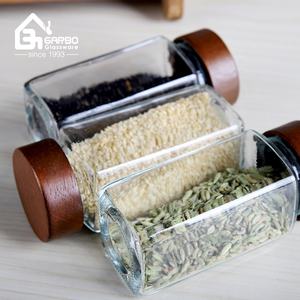 9 pz set <span class=keywords><strong>di</strong></span> bottiglie <span class=keywords><strong>di</strong></span> condimento <span class=keywords><strong>con</strong></span> Stand <span class=keywords><strong>di</strong></span> forma quadrata bottiglia <span class=keywords><strong>di</strong></span> <span class=keywords><strong>vetro</strong></span> <span class=keywords><strong>con</strong></span> <span class=keywords><strong>coperchio</strong></span> in legno vendita calda nel mercato Algeria fornitore della cina - Product Image 2