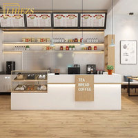 Design d'intérieurs de café moderne et confortable haut de gamme, mobilier de boulangerie, comptoir de bar en bois personnalisé, présentoirs, service