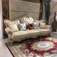 Ensemble de canapés en cuir véritable classique européen de luxe avec cadre en bois massif pour salon de villa, sculpture exquise, haut de gamme