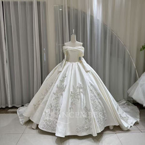 Vestido de Novia Moderno OY036 con Cuello Barco, Satén, Corte Imperio, Manga Larga, Cola Capilla, Encaje y Flores de Cristal - Product Image 1