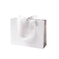 Sac en papier cadeau en ruban à nœud solide de haute qualité avec boutique imprimée personnalisée