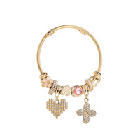 Bracelet perlé en alliage électroplaqué style Pan avec pendentif cœur trèfle à quatre feuilles pour femme - Bijoux Z1185-A