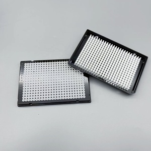 Piastra PCR 384 bene con telaio nero e tubo bianco prodotto in plastica a doppio componente per Roche - Product Image 1