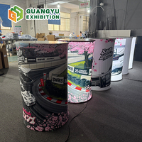 Table promotionnelle pliable et portable, légère, à montage rapide et personnalisable pour les marchés en plein air, les salons professionnels ou la promotion de rue