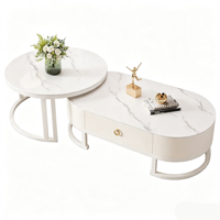 Ensemble de tables basses modernes de style crème avec plateau rond en pierre, tables gigognes de luxe, design décoratif combiné pour salon domestique