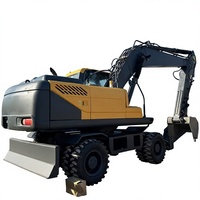 Excavatrice sur pneus Hyundai 210-9 d'occasion, modèle 21 tonnes, moteur Cummins 124KW, capacité de la benne 0,51-1,34m, boîte de vitesses, vente Shanghai
