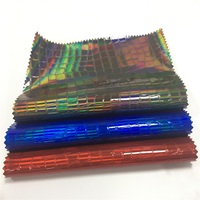 Feuilles de cuir synthétique PU holographique gaufré effet crocodile de qualité supérieure 0,7 mm, cuir métallique irisé pour la fabrication de sacs et de chaussures