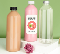 Bouteilles de boisson rondes transparentes en PET de 1000 ml (32 oz) avec bouchons à vis pour boissons énergisantes, café, vodka et bière - 50 pièces/carton