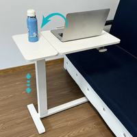 Table de lit roulante pneumatique en métal pour mobilier hospitalier avec plateau inclinable, design moderne pour usage patientiel dans les écoles et les chambres