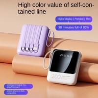 Vente en gros Mini portable câble de charge intégré chargeur de banque mobile haute capacité 10000 MA chargeur de téléphone portable universel