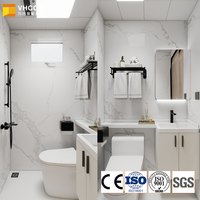 Maisonnette individuelle compacte à aménagement flexible avec douche et lavabo intégrés, isolée, idéale pour location de conteneur habitable avec toilettes