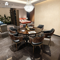 Luxuriöses Rundes Esszimmer-Set Esszimmerstühle Moderner Edelstahl-Sockel Esszimmermöbel 6 Sitzplätze für Zuhause für Villa Hotel