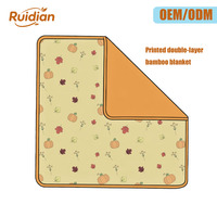 Couverture en bambou double couche personnalisée OEM ODM, imprimée sur le devant et unie au dos, douce et respirante, pour lit de bébé