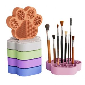 Nuevo Limpiador de Brochas de Maquillaje 2 en 1 de Silicona y Caja de Almacenamiento - Organizador de Brochas con Forma de Pata de Gato para una Limpieza y Almacenamiento Eficientes - Product Image 1
