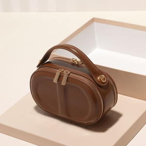 Elegant Women's Genuine Leather Oval <b>Mini</b> Bag With Round Handle Zip Closure Daily Use Handbag - Product Image 5