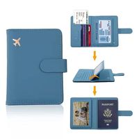 Cartera personalizada para pasaporte RFID Bloqueo de ranuras para tarjetas de pasaporte Titular de cuero PU Cierre magnético Estuche para tarjetas de identificación
