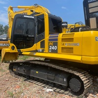 Excavadora de cadenas usada KOMATSU PC240LC con línea de martillos auxiliares completa y bajo mantenimiento para tareas de rompe roca ligera y limpieza de terrenos