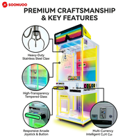 Promotion : Machine de grue automatique à pince avec logo personnalisé pour salles d'arcade et centres commerciaux, alimentation 110/220V et jetons personnalisables