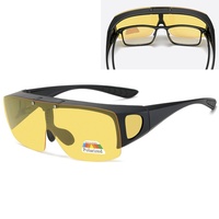 Lunettes de soleil Performance pour hommes et femmes Lunettes de soleil Vision de nuit Film jaune Lentille polarisée à changement de couleur Cadre noir/rouge PC