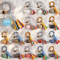 Porte-clés pendentif pomme en cristal naturel, breloque de sac à pompon en corde tressée à la main, accessoire de bijouterie style bohème, cadeau de vacances