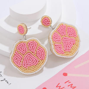Boucles d'oreilles tissées mode lumière luxe chien patte couleur riz perles pendentif boucles d'oreilles pour femmes Uionen 1870 - Product Image 1