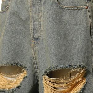 กางเกงยีนส์ขาสั้นทรงหลวมสีน้ำเงินสำหรับผู้ชาย แต่งซิป ขอบดิบ ผ้าฝ้าย 100% สไตล์ Destroyed Baggy Fit - Product Image 4