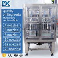 Machine d'embouteillage automatique à têtes multiples 40BPM Bouteilles de 500ml avec bouchon rabattable Remplisseuse de liquide automatique