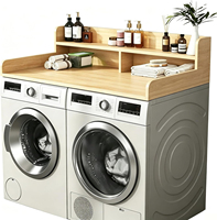 Comptoir de buanderie en bois à 2 niveaux pour lave-linge et sèche-linge, avec tapis antidérapant, étagère de 6,5 pouces et barrières de protection, 54x27,5 pouces, durable et écologique