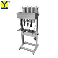 Machine de remplissage de bouteilles en verre liquide de vide de remplisseur de vin blanc pneumatique YT-4