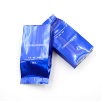 Sachet en plastique brillant bleu avec soufflet latéral et soudure centrale, pochette thermoscellable personnalisée pour emballage cosmétique