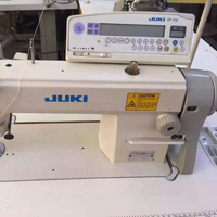 Machine à coudre JUKIS DLN 5410 N-7 d'occasion avec table