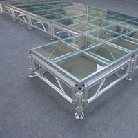 Scène en verre portable en alliage d'aluminium transparent avec design modulaire et haute capacité de charge pour les mariages