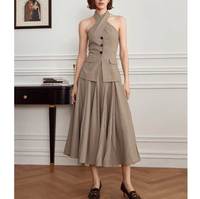 Nouvelle Collection Printemps-Été 2025 – Ensemble Jupe Mi-Mollet Élégant et Uni avec Gilet Sans Manches Plissé Respirant – Tenue Deux Pièces pour Femme