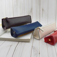 Étui à crayons cylindrique en cuir PU de couleur unie minimaliste, fermeture éclair imperméable, pochette à stylos portable, papeterie pour étudiants et professionnels