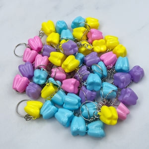 50 pièces/sac Boîte à dents de bébé en plastique Porte-clés, Forme de dent Boîte de rangement pour dents de lait pour enfants pour souvenirs et cadeaux de <span class=keywords><strong>collection</strong></span> - Product Image 5