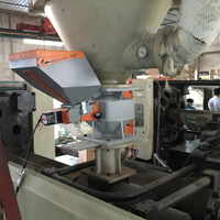 Doseur volumétrique à vis monocouleur à petite capacité pour machine d'injection
