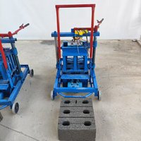 Petite construction manuelle mobile Machine de fabrication de blocs de béton d'argile et de boue de sol rouge Machine de fabrication de briques à emboîtement en vente au Royaume-Uni