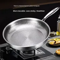 Poêle à frire plate en alliage de titane non revêtue avec motif martelé pour une cuisine saine