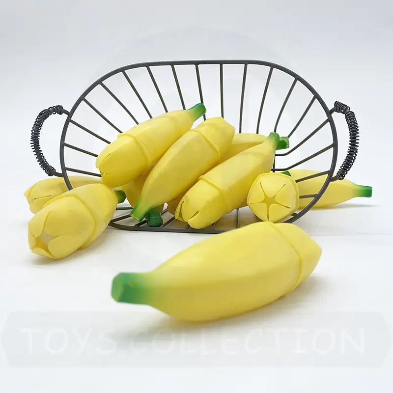 Vente en gros en vrac Tiktok Drôle Soulagement du Stress Squeeze Pop Out Extensible Fruit Expression Visage Banane Enfants Fidget Jouet Prix Usine