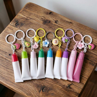 Fournisseur d'usine – Nouveaux tubes de brillant à lèvres mignons avec porte-clés, étiquette privée OEM, qualité stable, breloques décoratives, conteneurs de brillant à lèvres