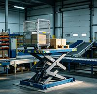 Plateforme élévatrice à ciseaux électrique fixe 4-15m, table de travail hydraulique robuste en acier jaune, capacité de charge 500kg-50000kg pour l'industrie manufacturière