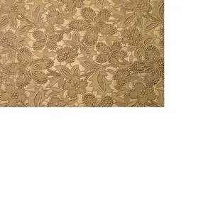 metallic embossed handmade papers in golden color with floral pattern embossing for wedding cards, invitation designers, wedding