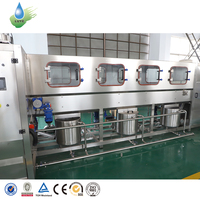 Machine de remplissage automatique d'eau de 5 gallons, 400 bph, ligne de production de lavage et de bouchage de barils de 19 L pour usine d'eau potable