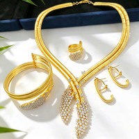T436A Vente en gros d'usine, Nouveauté : Ensemble de bijoux exquis 4 pièces pour femme, motif fleur de lys africaine NAIJA, idéal pour mariage et rendez-vous, Dernière collection