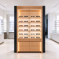 Comptoir îlot en verre noir pour magasin d'optique avec étagères lumineuses pour présentation de lunettes CE ETL