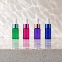 Petit flacon compte-gouttes en verre avec bouchon coloré, flacon d'échantillon cosmétique vide, format voyage, vente en gros, fournisseur OEM ODM
