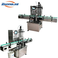 Remplisseuse automatique de liquides à double tête servo Zhongjie pour eau, boissons, huile comestible avec bouteilles en plastique/verre/métal