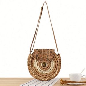 Bolso de playa ecológico de estilo bandolera con decoración bordada de paja redonda y dos asas. - Product Image 1