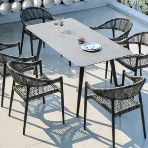 Juego de muebles de comedor duraderos para jardín y patio, Mesa de Piedra, sillas de ratán de PE, juegos de comedor al aire libre